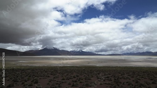 Barren and desolate landscape of Salar de Surire, a salt lake in Vicunas National Park at the high altitude of the Altiplano of north Chile. photo