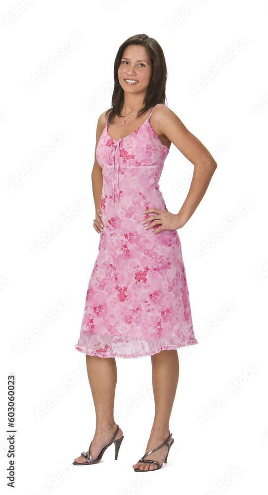 Image of a beautiful young brunette in a pink dress against a white background. Image of a beautiful young brunette in a pink dress against a white background.