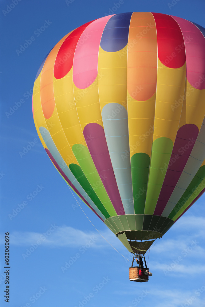 Fototapeta premium A hot air balloon high in the sky.