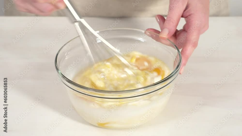 Time lapse. Step by step. Mixing ingredients in a glass mixing bowl to bake chocolate bundt cake with chocolate frosting. Time lapse. Step by step. Mixing ingredients in a glass mixing bowl to bake chocolate bundt cake with chocolate frosting.