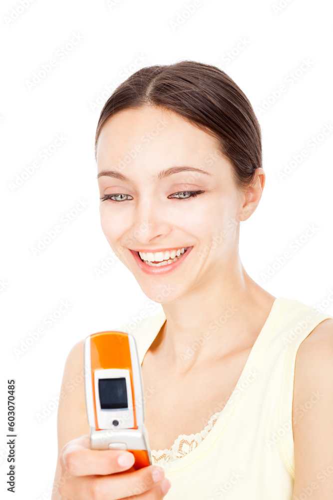 Young woman reading text messages on cellphone over white background Young woman reading text messages on cellphone over white background