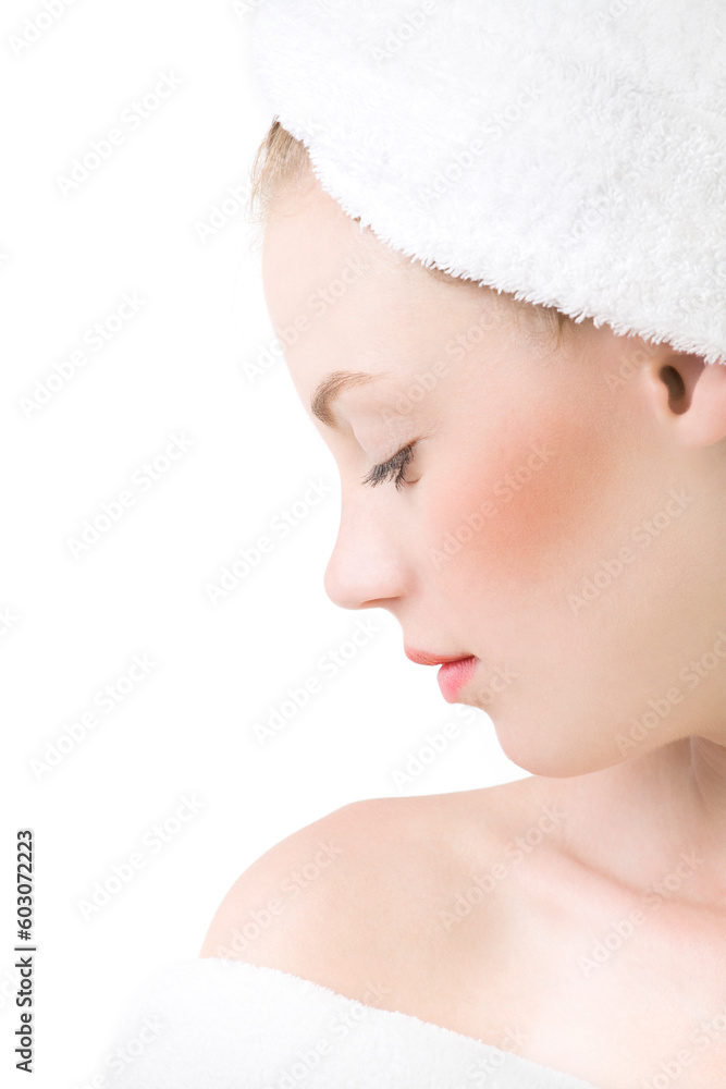 Close-up portrait of a stunning young woman relaxing in the spa, isolated on white background Close-up portrait of a stunning young woman relaxing in the spa, isolated on white background