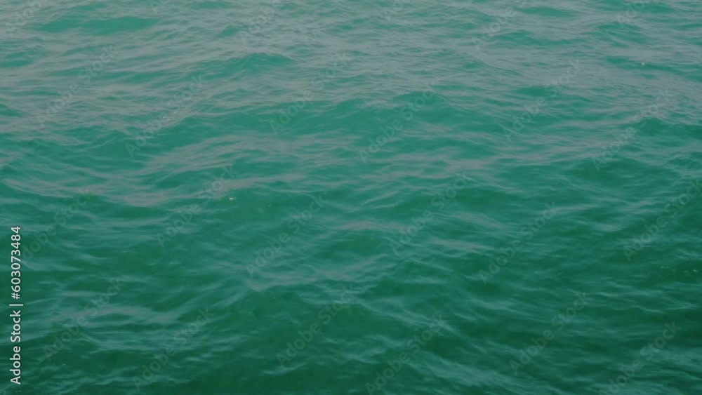 Travel summer concept of calming waves. Holiday at the tropical sea. Landscape view of Thailand sea in summer day. Wave. Travel summer concept of calming waves. Holiday at the tropical sea. Landscape view of Thailand sea in summer day. Wave.