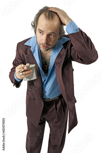 A sleazy car salesman, Con man, retro suit wearing cool guy with worried facial expression drinking from a flask and smoking.