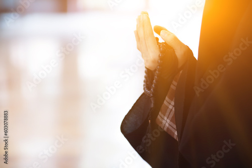 muslim women in hijab are praying to show respect and thanks to allah according to muslim belief and muslim women in hijab are praying to allah according to traditional belief from quran