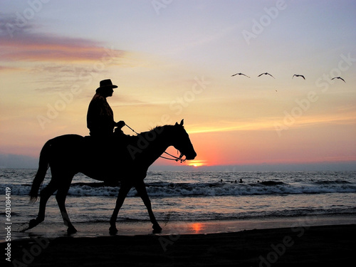 Lone rider at sunset