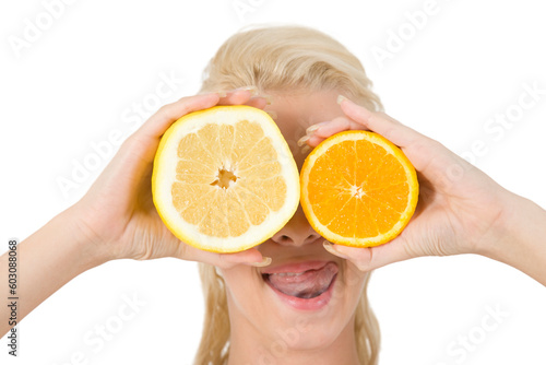 pretty lady covering her eyes with slice of fruits on isolated studio pictures