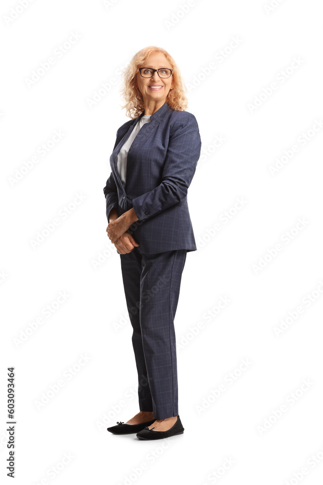 Smiling mature businesswoman in a navy color suit Smiling mature businesswoman in a navy color suit