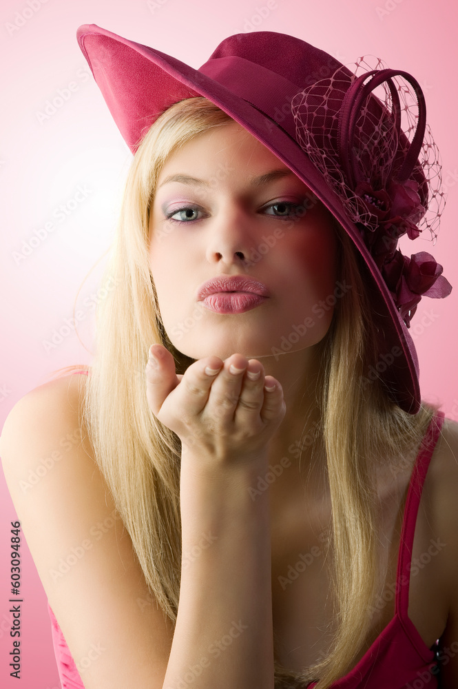 very nice girl with blue eyes and red hat giving a virtual kiss very nice girl with blue eyes and red hat giving a virtual kiss