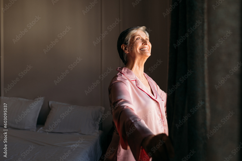 Woman in Pajamas Looking Through Window Woman in Pajamas Looking Through Window
