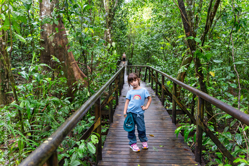 Little girl explorer in Costa Rica rainforest travel