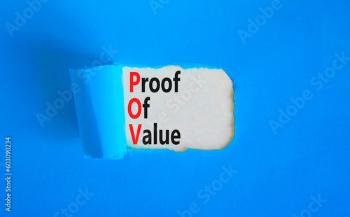 POV Proof of value symbol. Concept words POV Proof of value on beautiful white paper. Beautiful blue table blue background. Business and POV Proof of value concept. Copy space. photo