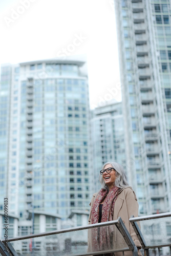 Wallpaper Mural Stylish woman outside wearing jacket and scarf in winter. Torontodigital.ca