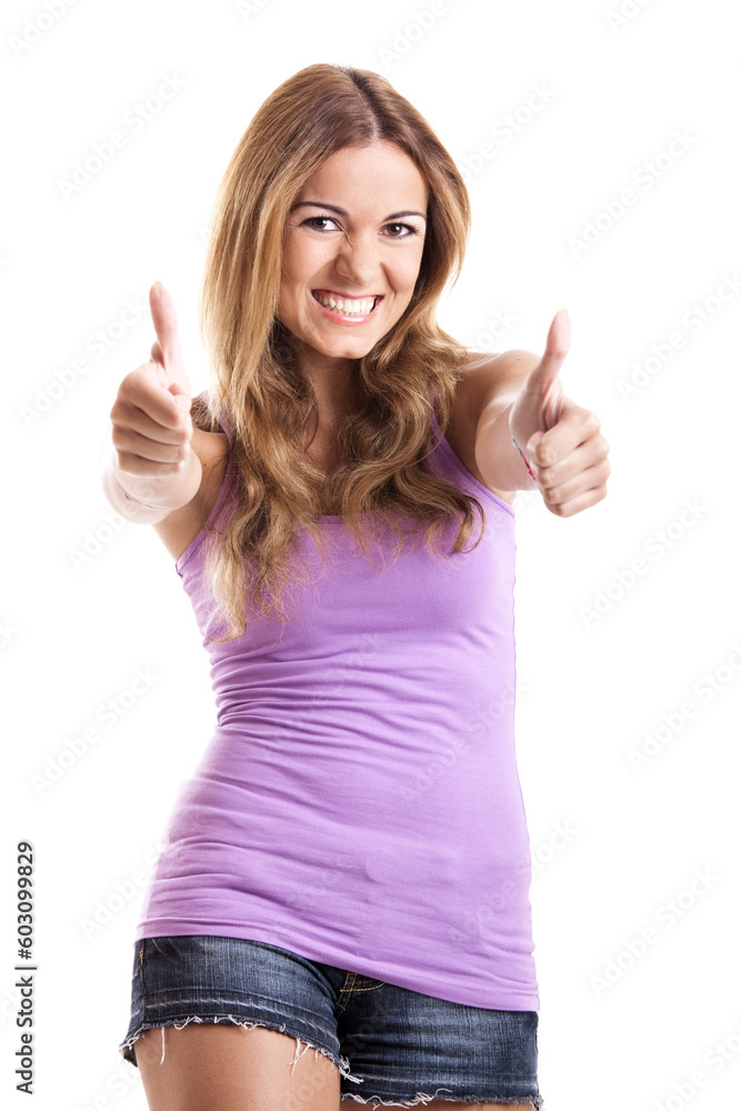 Portrait of a beautiful happy young woman showing thumbs up Portrait of a beautiful happy young woman showing thumbs up