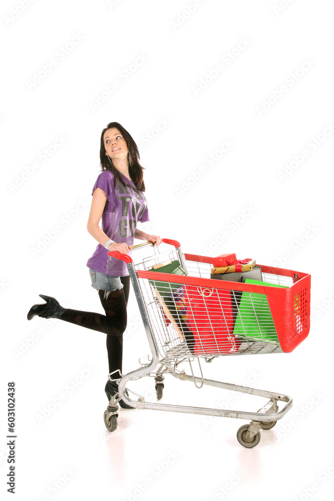 girl with shopping cart over white background girl with shopping cart over white background