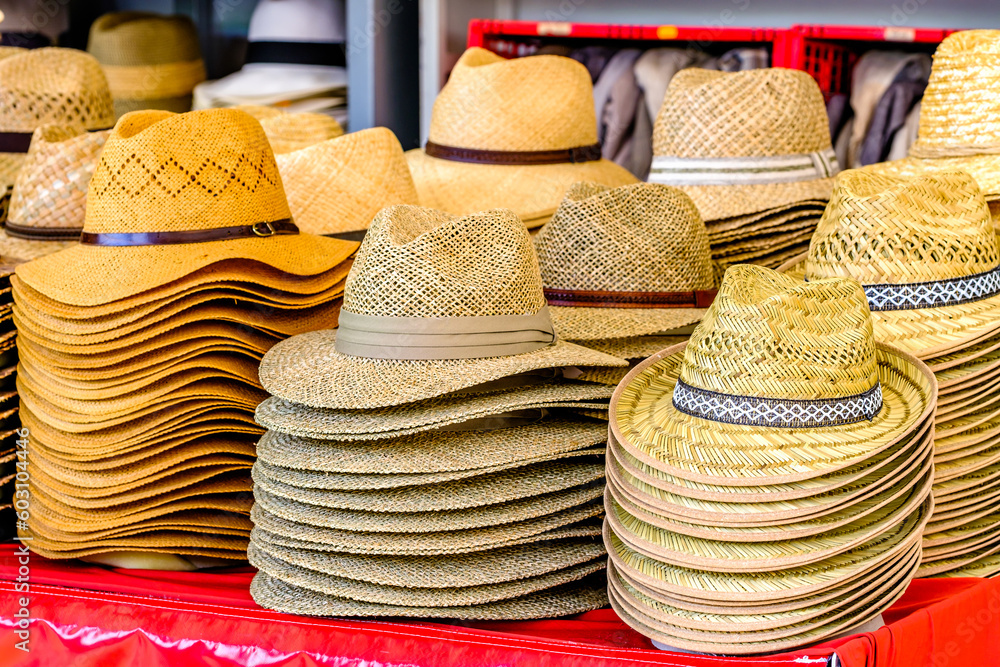 straw hats at a market