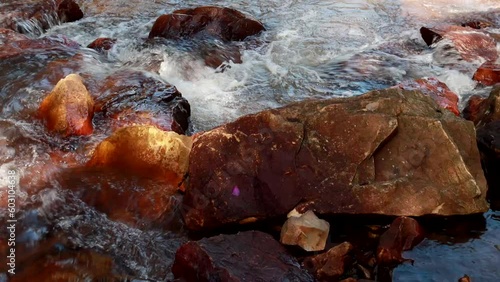 The small river known as Rio dos Goianos that flows into the Waterfall Known as Cachoeira Boqueirao in Paranoa, Brazil, near Brasilia photo