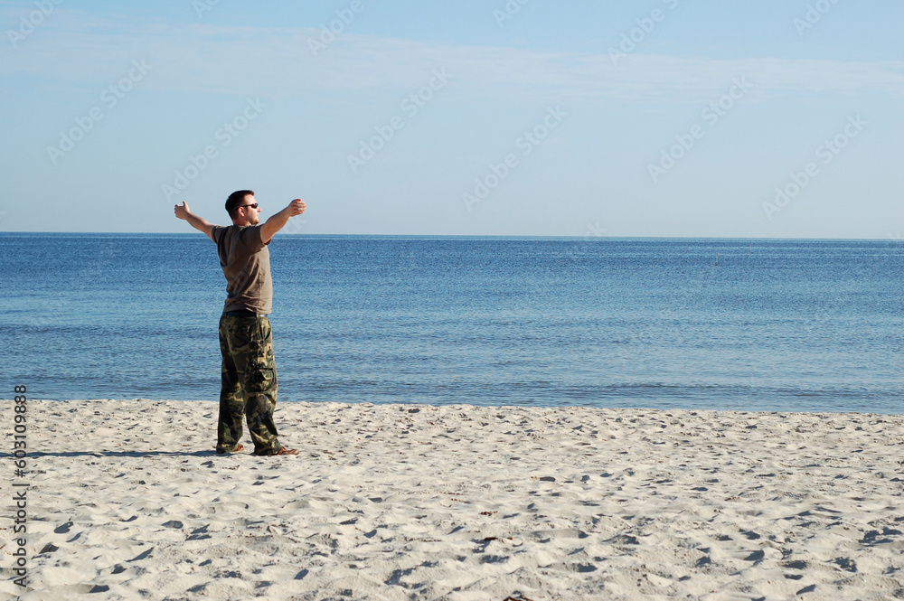 man relaxing on the beach