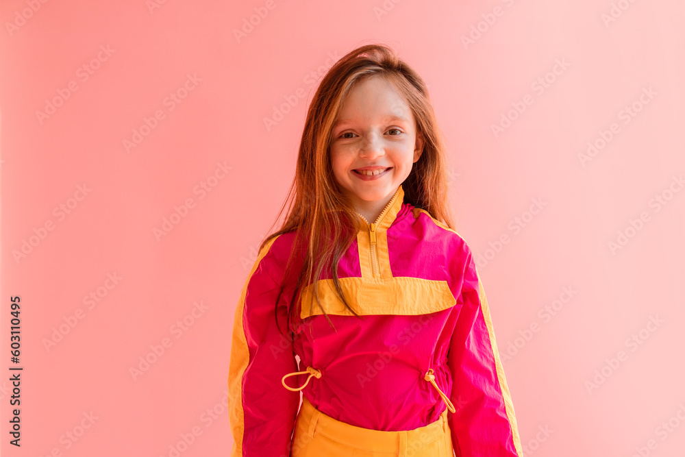 Portrait of little girl on pink background Portrait of little girl on pink background