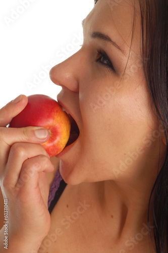 attractive woman with apple on white background