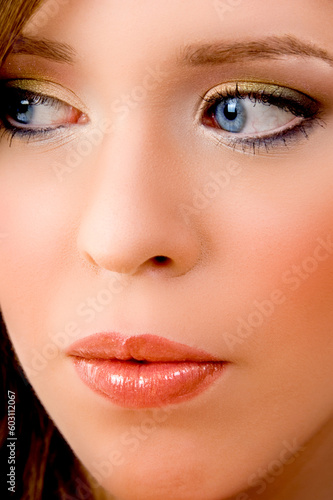 close view of woman s face on an isolated white background