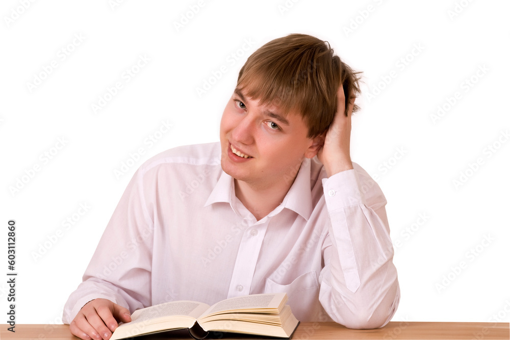 Handsome man sitting and reading in library over white background Handsome man sitting and reading in library over white background