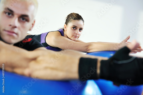 Fototapeta Naklejka Na Ścianę i Meble -  woman exercise fitness and get nice fit shape in fitness sport club indoor