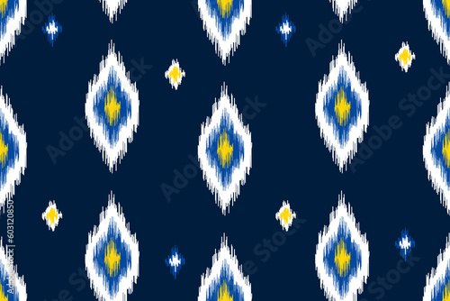Ikat geometric ethnic Maya seamless pattern. Native American, Indian, African, Mexican, Moroccan style. Design for clothing, textile, fabric, scarf, home decor, wallpaper, texture, carpet, tile. 