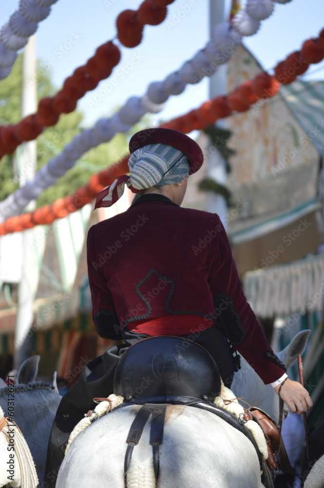 Horse riders in the famous April fair of Seville, Andalusia, Spain 