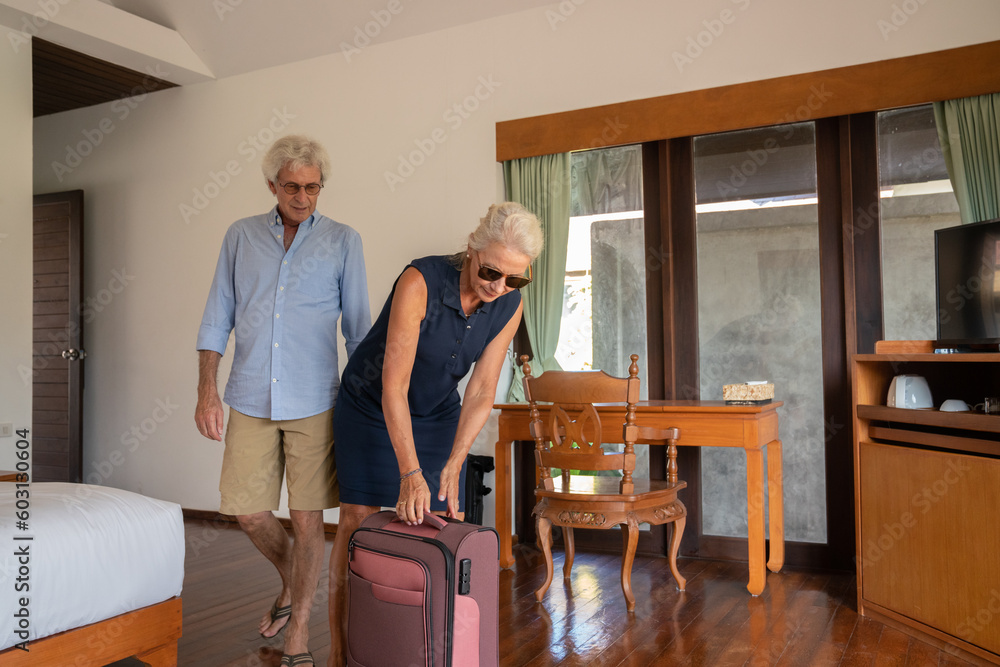 Candid Image Of Senior Couple In Resort Room Candid Image Of Senior Couple In Resort Room