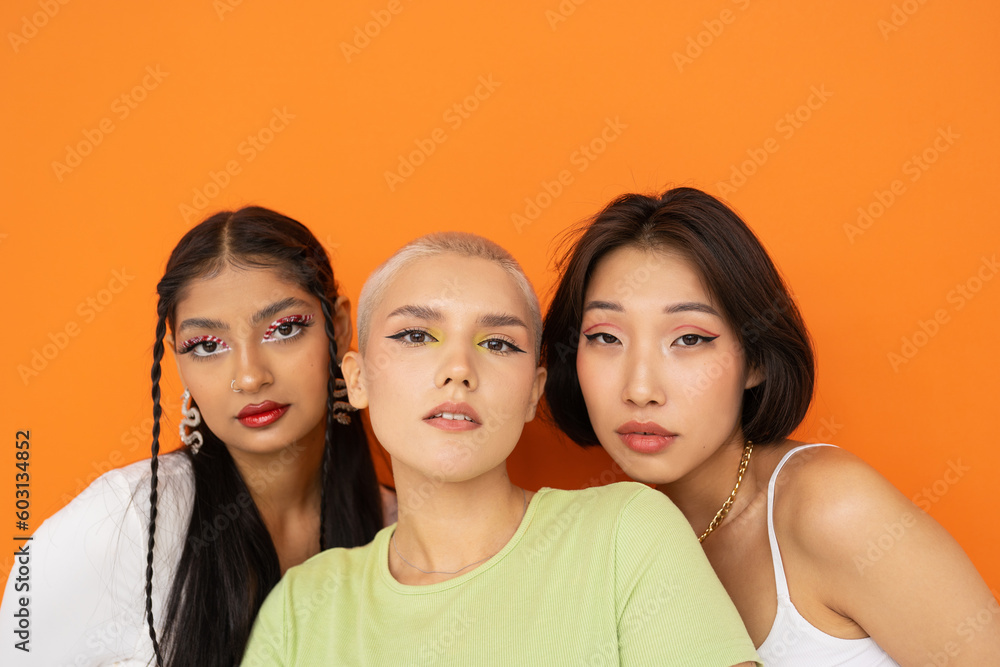 Diverse female models looking at camera Diverse female models looking at camera