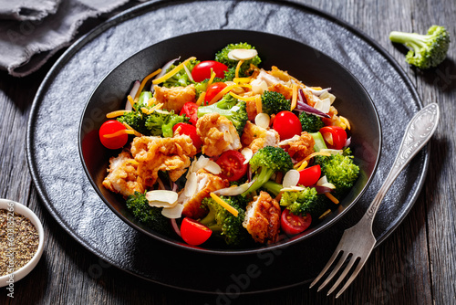 fried chicken tenders broccoli salad in bowl
