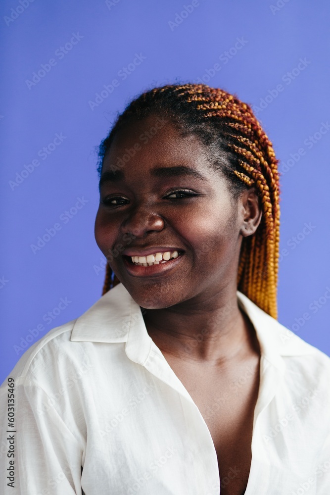 Happy woman smiling and looking at camera Happy woman smiling and looking at camera