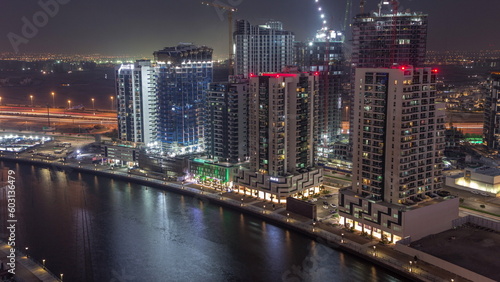 Towers at the Business Bay aerial day to night timelapse in Dubai  United Arab Emirates