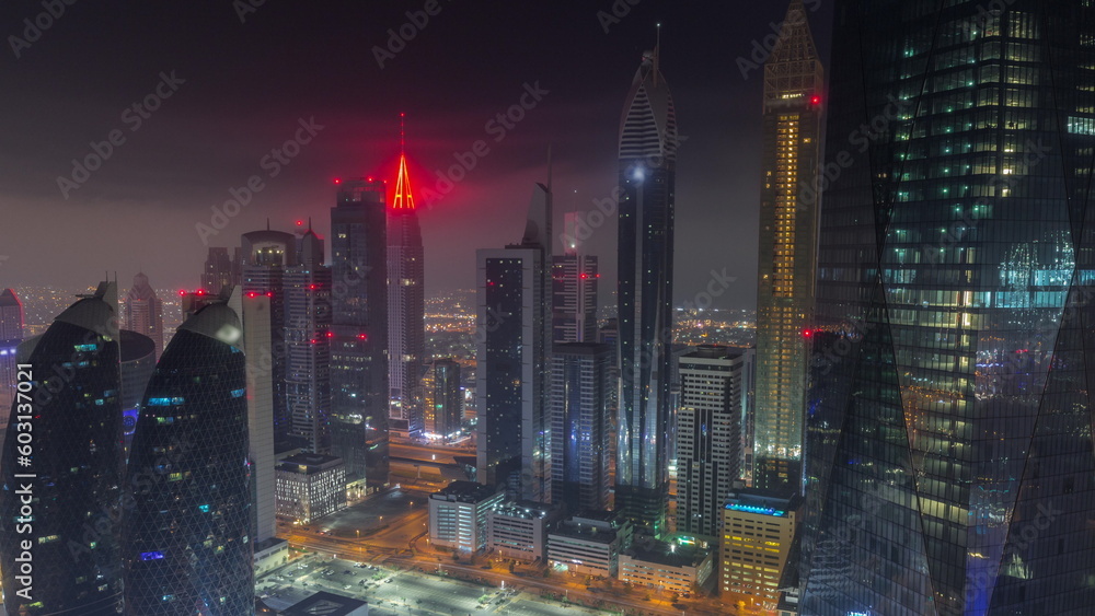 Financial center of Dubai city with luxury skyscrapers all night timelapse, Dubai, United Arab Emirates