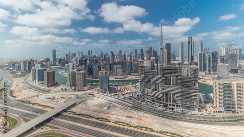 Panorama showing skyline of Dubai with business bay and downtown district timelapse.