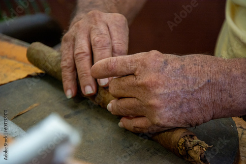 Close up of cigar rolling in Cuba © Aafia