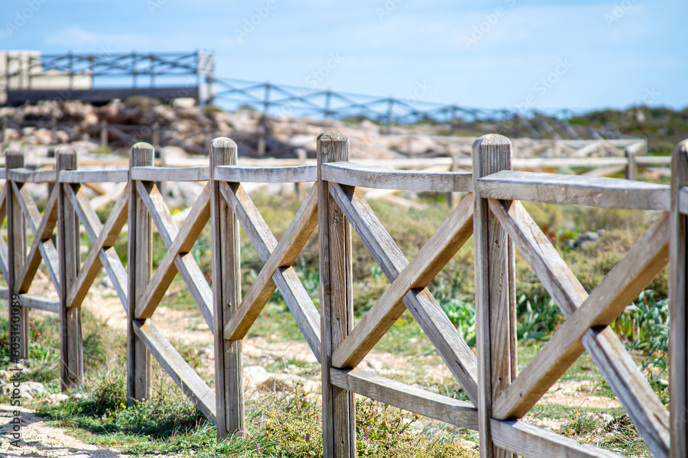 Wooden fence on Algarve coast outside Lagos, Portugal.