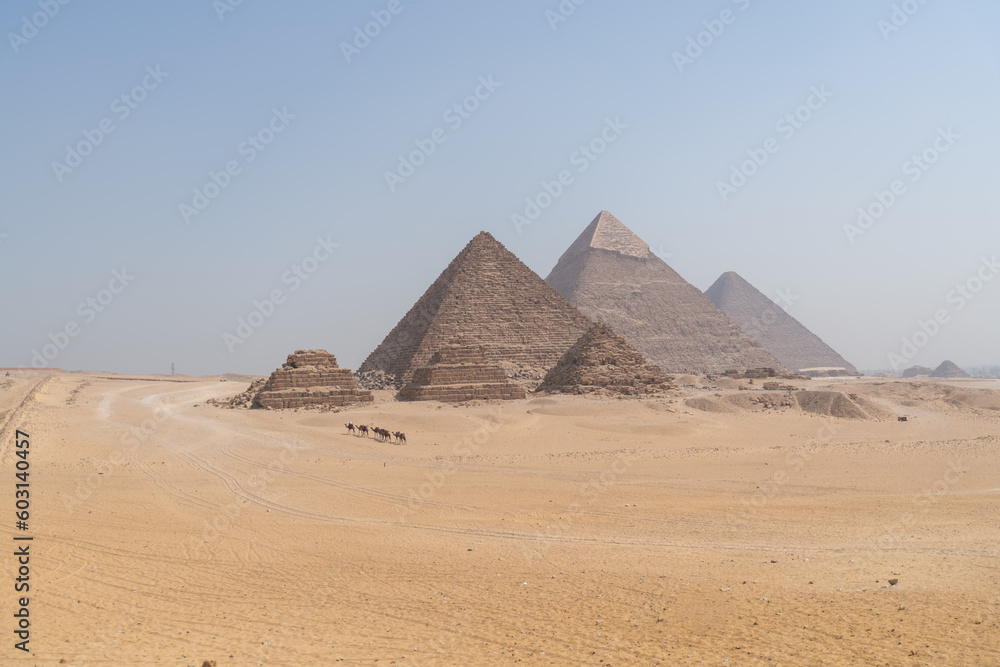 The Giza pyramid complex also called the Giza Necropolis against the blue sky in cairo egypt