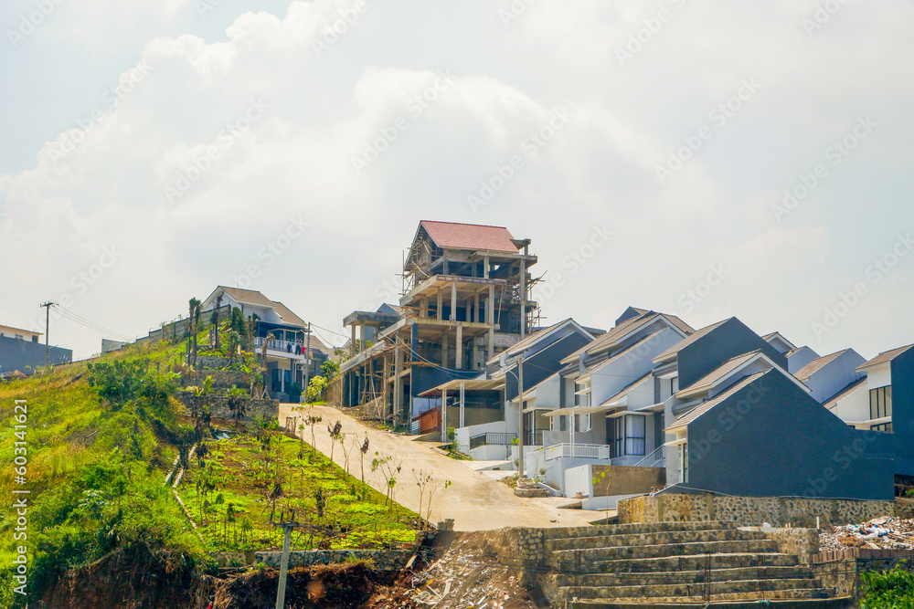 real estate on a hill around green trees real estate on a hill around green trees