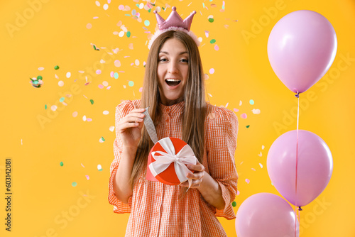 Surprised young woman with ...