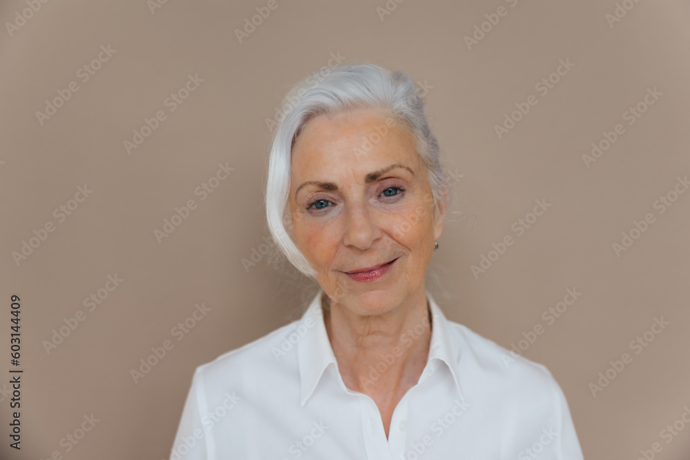 Woman in simple studio with serious expression. Woman in simple studio with serious expression.