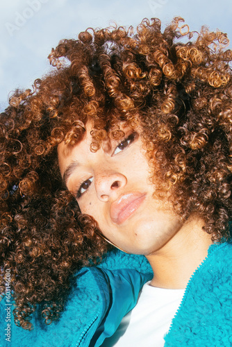 Portrait of curly-haired woman