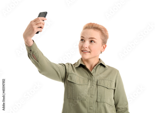 Young woman taking selfie w...
