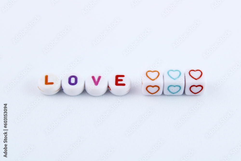 Word love and hearts formed by plastic beads Word love and hearts formed by plastic beads
