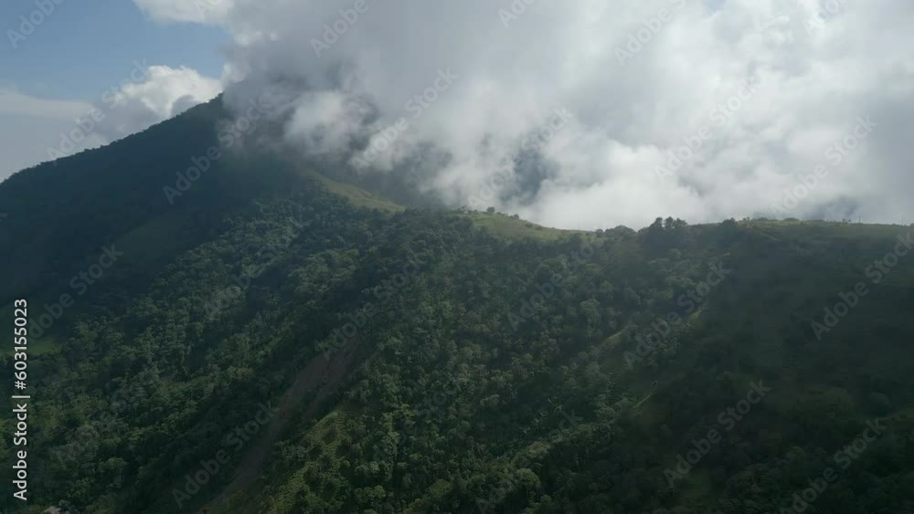 Clouds passing over a forest covered mountain in Arboledas, Colombia Clouds passing over a forest covered mountain in Arboledas, Colombia