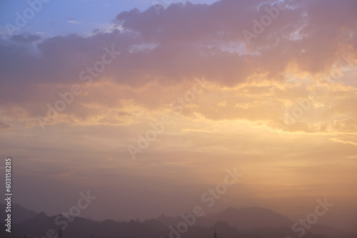 Sunset landscape with dark mountain peaks in egyptian desert © bilanol