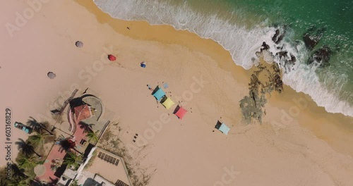 Vista aerea cenital de dron en playa paradisiaca photo