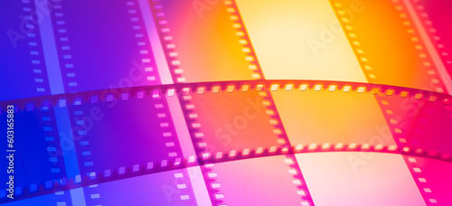 multicolored abstract background with film strip.film festival filmmaking movie announcement concept