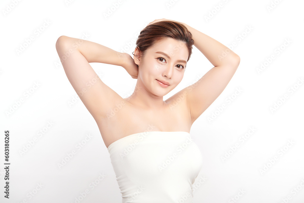 Beautiful Young Asian woman lifting hands up to show off clean and hygienic armpits or underarms on white background, Smooth armpit cleanliness and protection concept Beautiful Young Asian woman lifting hands up to show off clean and hygienic armpits or underarms on white background, Smooth armpit cleanliness and protection concept